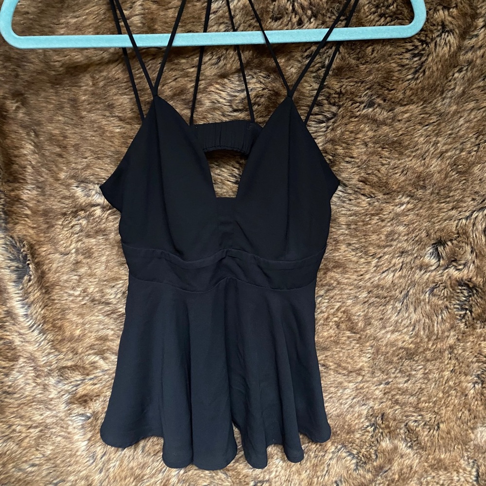 Express black blouse with crossing straps on back